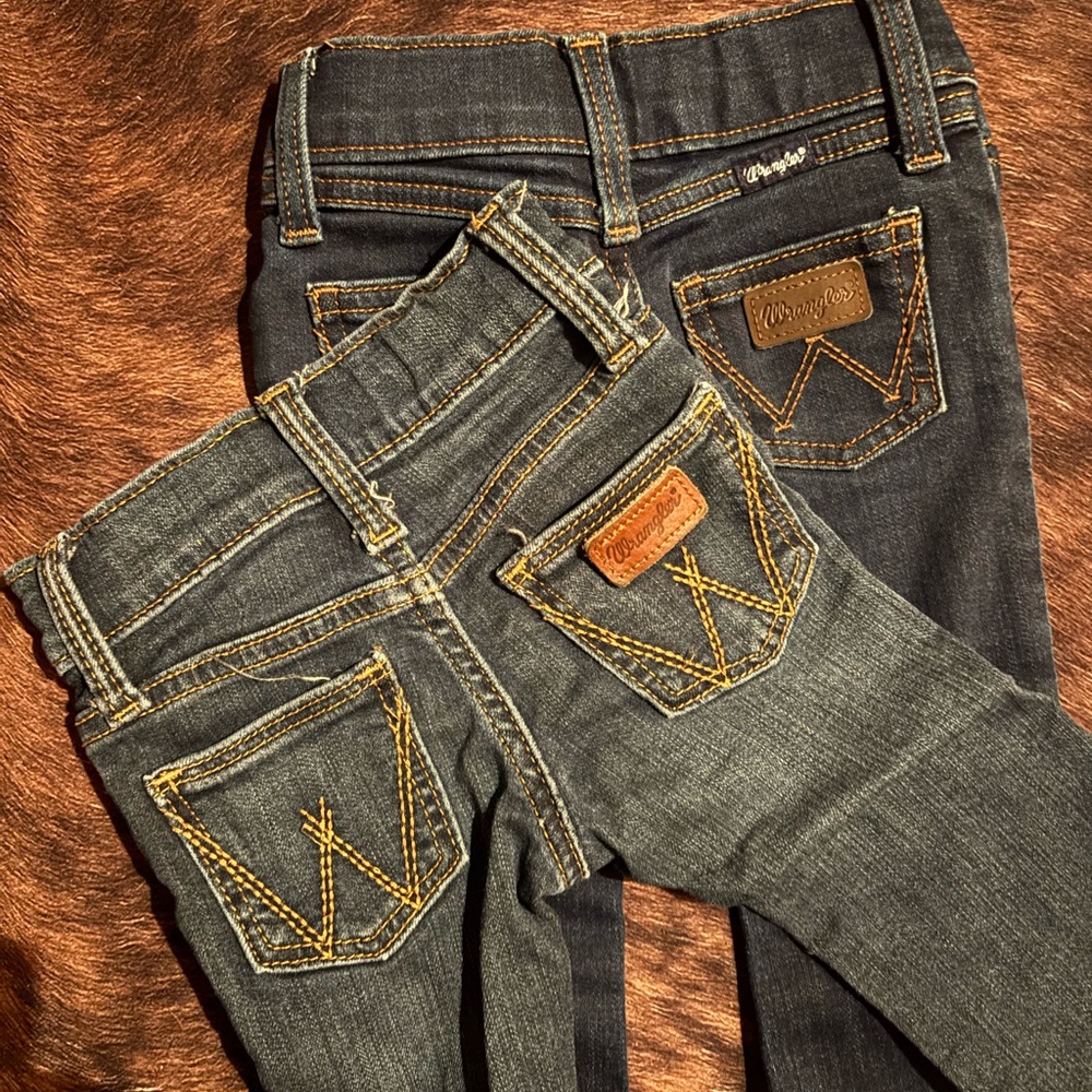Wrangler 6-9M Jeans 
Both used twice EUC
